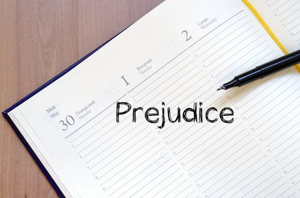 Prejudice write on notebook — Stock Photo, Image
