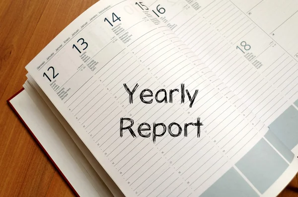 Yearly report write on notebook — Stock Photo, Image