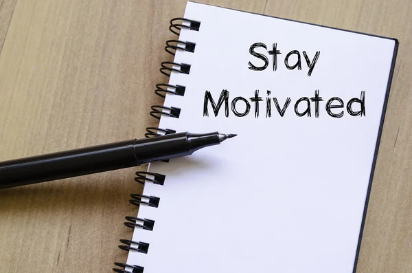 Stay motivated write on notebook — Stock Photo, Image