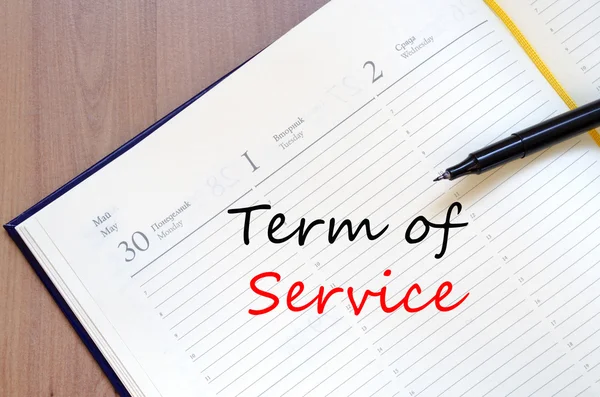 Term of service write on notebook — Stock Photo, Image