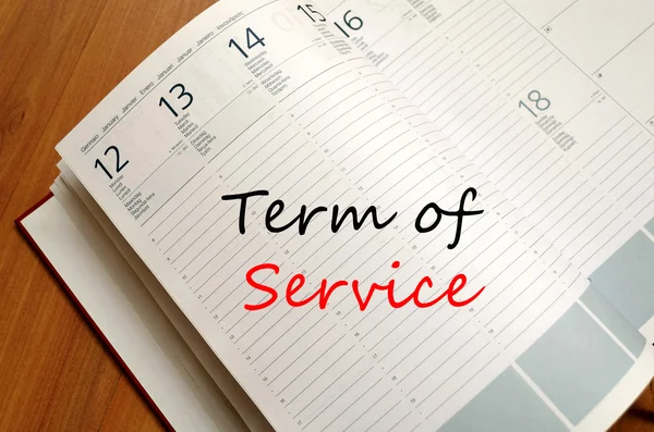 Term of service write on notebook — Stock Photo, Image