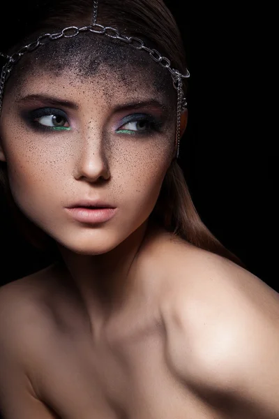 Woman with dark dusty make up Stock Picture