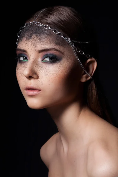 Woman with dark dusty make up Stock Photo