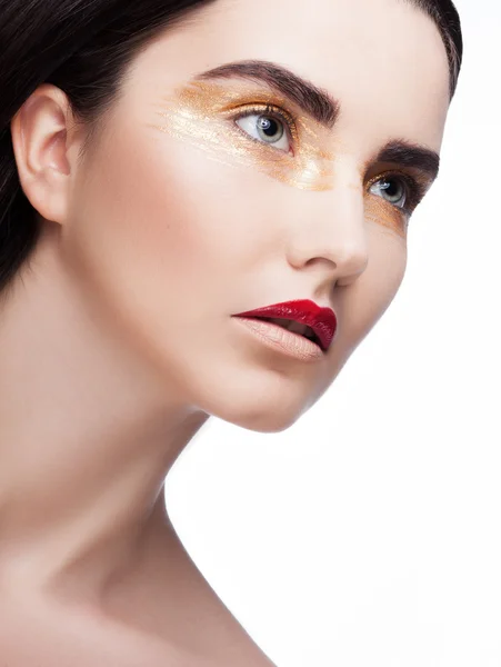 Frau mit goldenem Make-up — Stockfoto