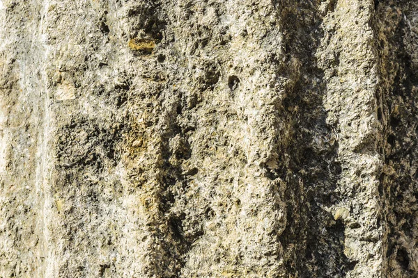 Mur de pierre érodé comme fond — Photo