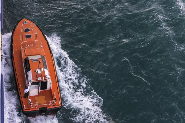 Coast pilot preparing to guide a cruise in Barcelona