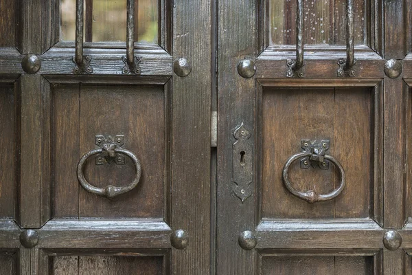 Old barred door — Stock Photo, Image