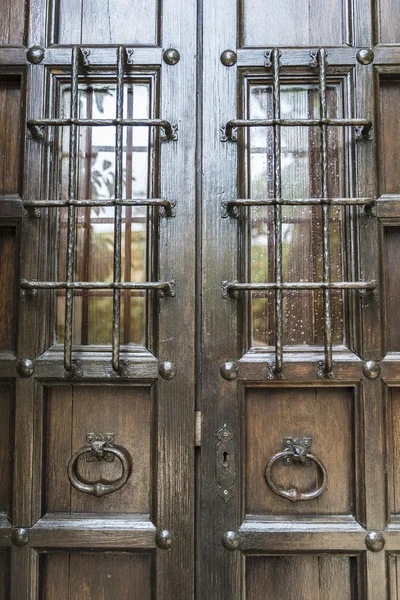 Old barred door — Stock Photo, Image