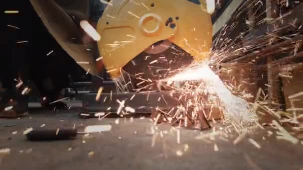 Sawing with a circular saw metal, many sparks. Safety violation — Stock Video