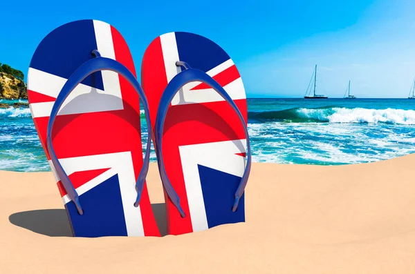 Flip flops with British flag on the beach. the Great Britain resorts, vacation, tours, travel packages concept. 3D rendering