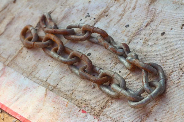 old chain for car on white background.