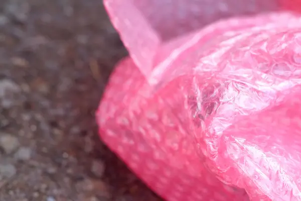 Plástico à prova de choque rosa para proteção contra impactos . — Fotografia de Stock
