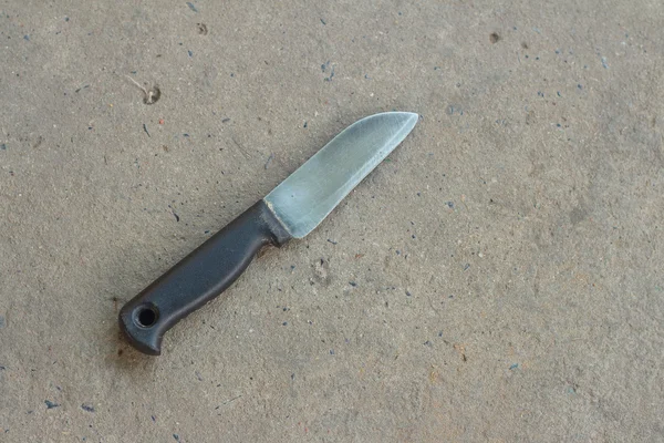 A kitchen knife on a gray background. — Stock Photo, Image