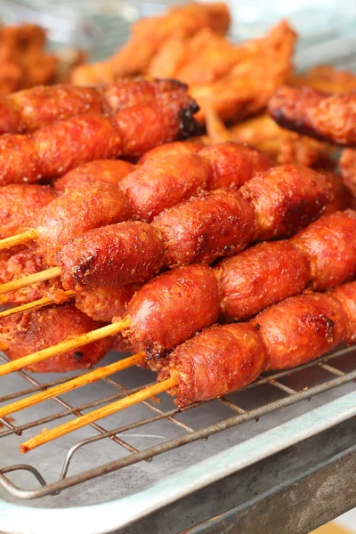 BBQ sausages on the grill in the market — Stock Photo, Image