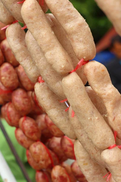 BBQ sausages on the grill in the market — Stock Photo, Image