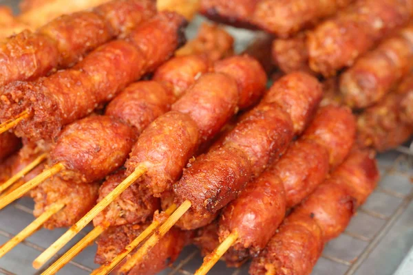 BBQ sausages on the grill in the market — Stock Photo, Image