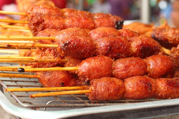 BBQ sausages on the grill in the market — Stock Photo, Image