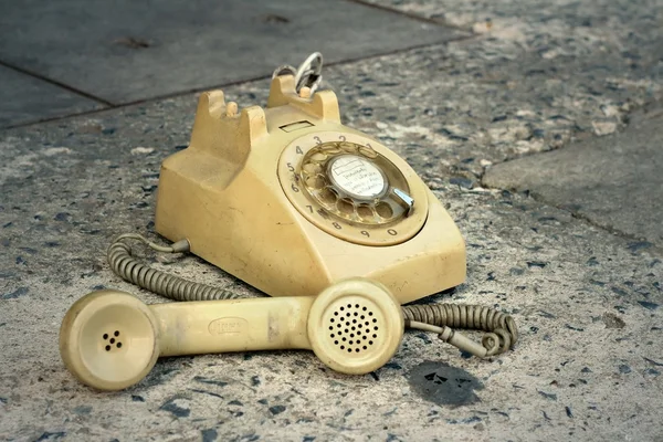 brown old phone vintage style on a floor.
