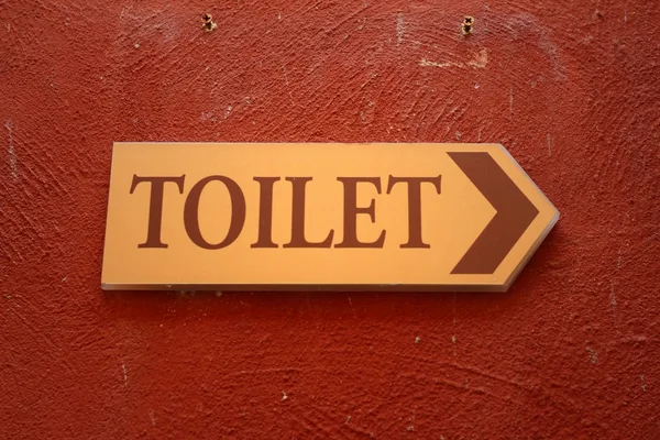 Etichetta vintage toilette su sfondo marrone . — Foto Stock