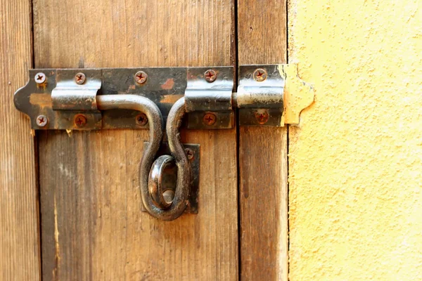 Lock of the door locked with padlock. — Stock Photo, Image