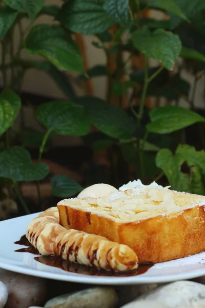 Honey toast on white dish at cake shop — Stock Photo, Image
