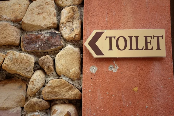 Etichetta vintage toilette su sfondo marrone . — Foto Stock