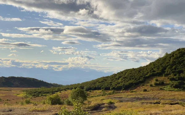 Amazing nature of Kamchatka. Autumn landscapes of central Kamchatka. Picturesque hills, plains and mountains. Travel to the Kamchatka Peninsula