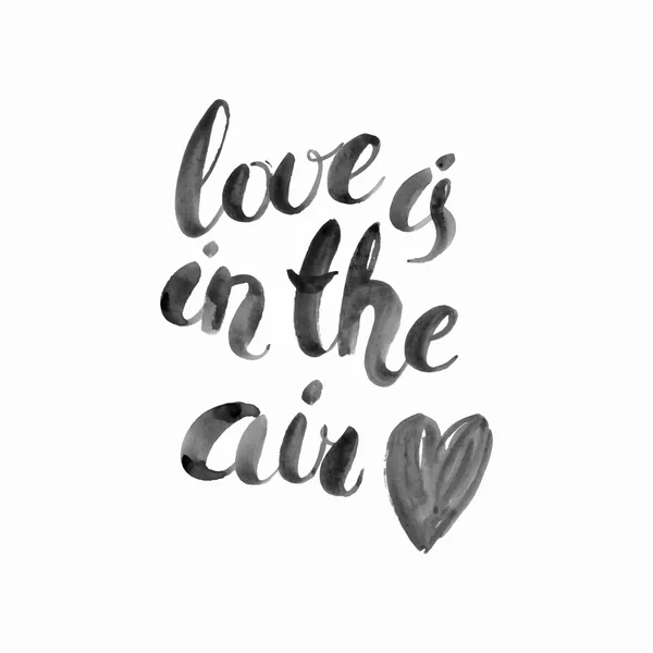 L'amour est dans l'air. Aquarelle dessinée à la main lettrage noir et blanc — Image vectorielle