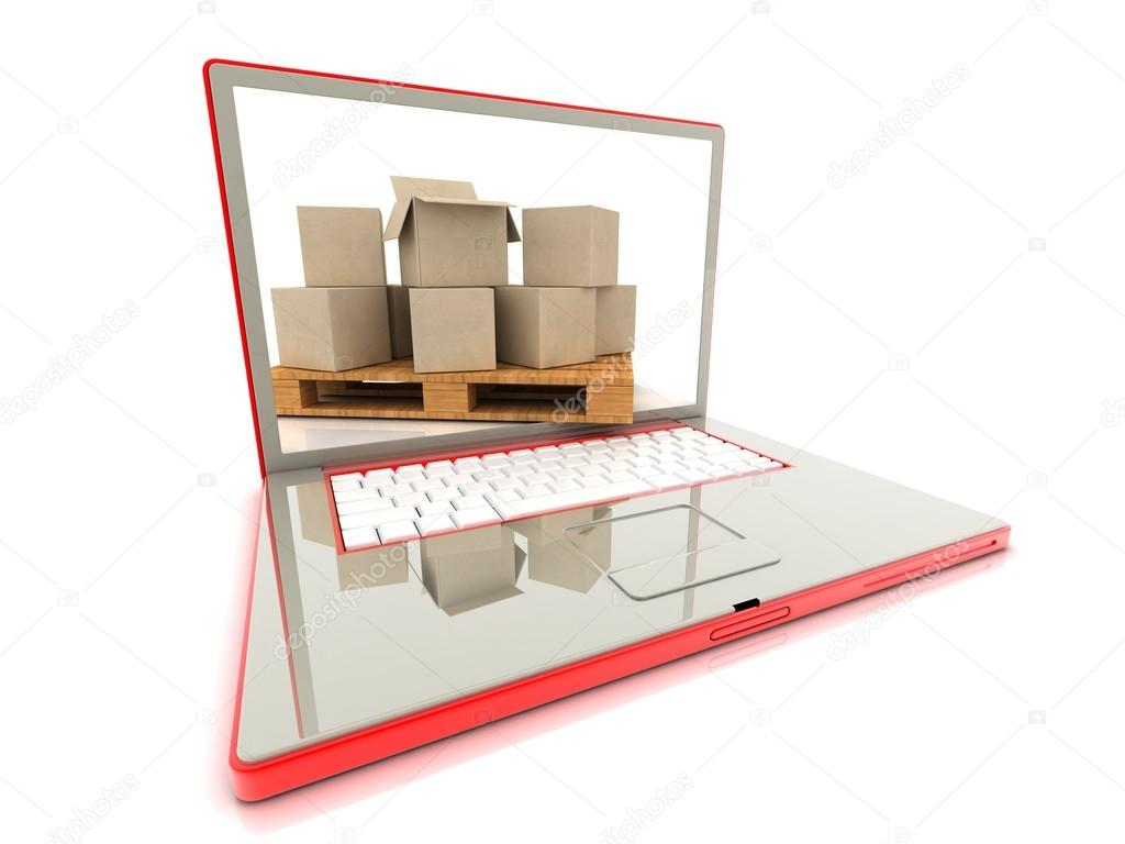 Cardboard boxes on a laptop. concept of e-commerce