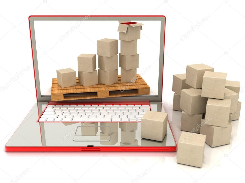 Cardboard boxes on a laptop. The concept of online orders for goods.