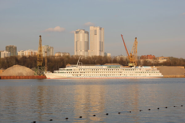 Motorships in river harbour