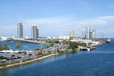 The view of MacArthur Causeway stretching along Main Channel and Miami Beach skyline in a background (Florida).