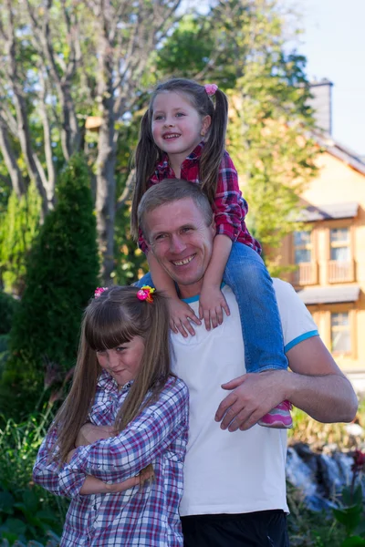 Father and two daughters — Stock Photo, Image