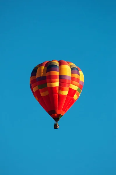 Beautiful hot air balloons ascending.Hot air balloon in the blue sky.