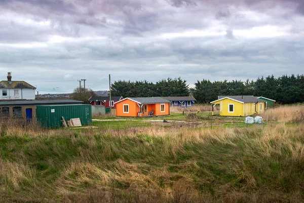 The Sportsman Pub, Whitstable, Kent, İngiltere 'deki kulübeler..