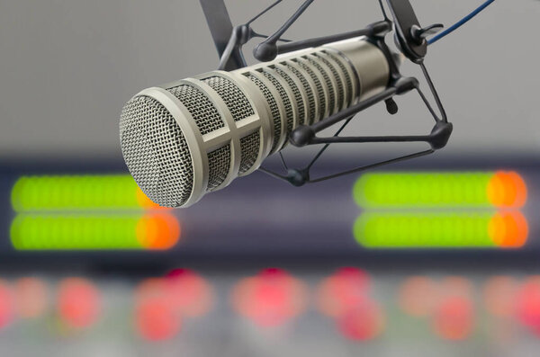 Professional microphone and sound mixer in radio station studio