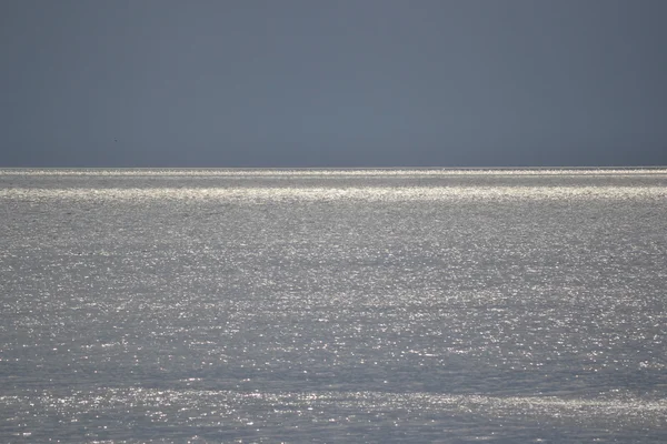 Güneş, deniz ve gökyüzü arka plan yansıması — Stok fotoğraf