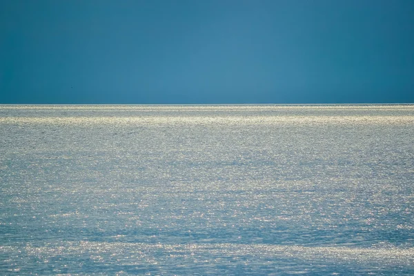 Reflexão de fundo do sol, mar e céu — Fotografia de Stock