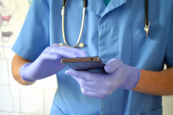 medical doctor with phone
