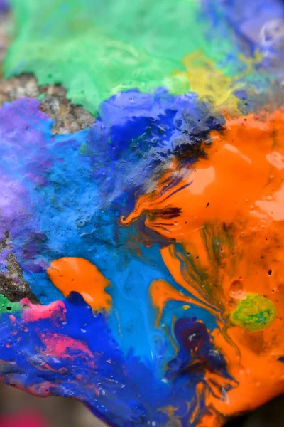 rocks covered with colorful paint close-up