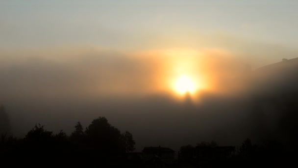 Sunrise in the mountains with morning fog — Stock Video