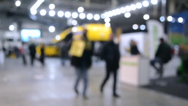 Blurred background. People walk inside large space building. — Stock Video