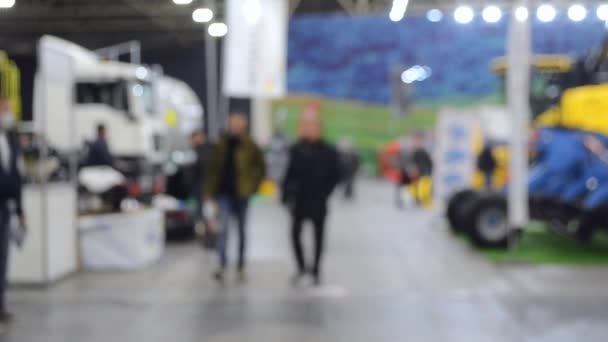 Blurred background. People walk inside large space building. — Stock Video