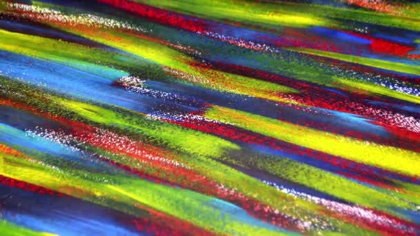 Many colorful bright colored paint lines drawn on canvas close-up. — Stock Video