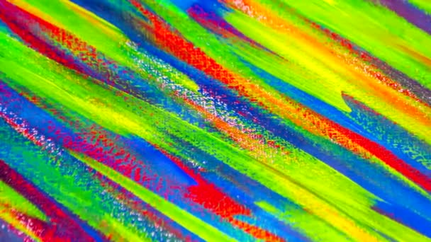 Many colorful bright colored paint lines drawn on canvas close-up. — Stock Video