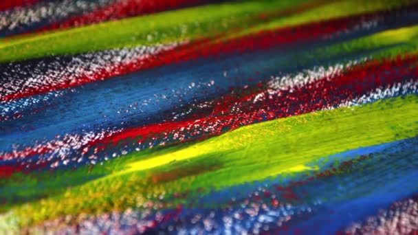 Toile lignes recouvertes de peintures multicolores close-up. — Video