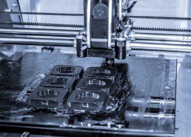 Modern 3D yazıcı yazıcı figürü yakın plan. Otomatik olarak üç boyutlu