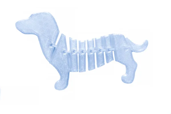 Ljus ljus vit objekt i form av hund leksak tryckt på 3D-skrivare — Stockfoto