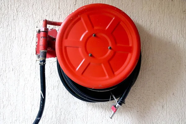 Old Red Fire Hose Reel, Closeup Photo Stock Photo - Image of