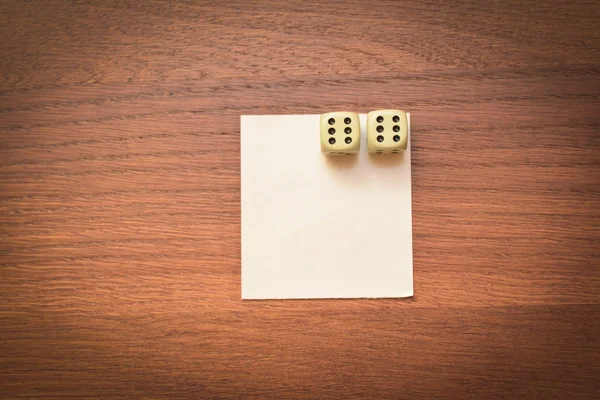 Two dice and a clean sheet — Stock Photo, Image